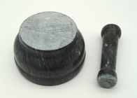 Mortero de piedra negro del mortero y del maja, de mármol y forma redonda determinada de la maja